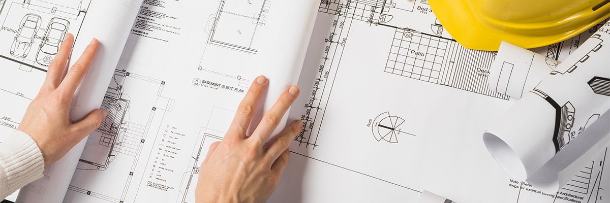 crop-architect-opening-blueprint.jpg